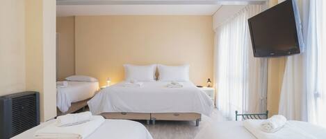 Family Room | Hypo-allergenic bedding, down duvets, in-room safe, free WiFi