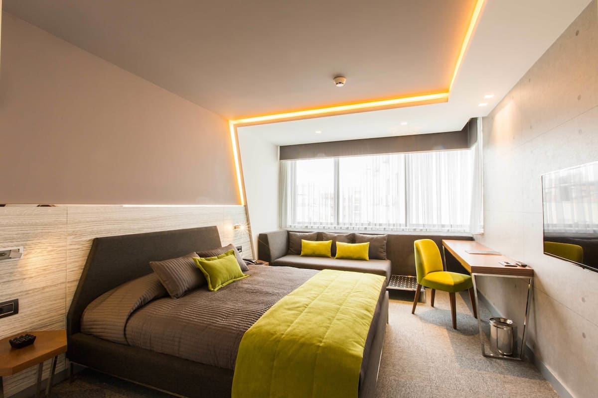 Deluxe-Doppelzimmer | Hochwertige Bettwaren, Minibar, Zimmersafe, Schreibtisch