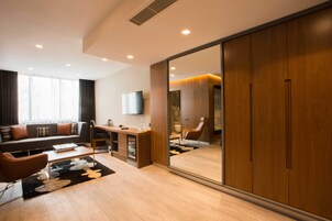 Exclusive Studio Suite | Living room | 42-inch LED TV with satellite channels, TV