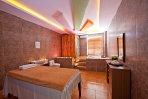 A modern hotel room with a bed, a vanity with a mirror, a sink, and a window with blinds. - Muong Thanh Lai Chau Hotel (Lai Chau)