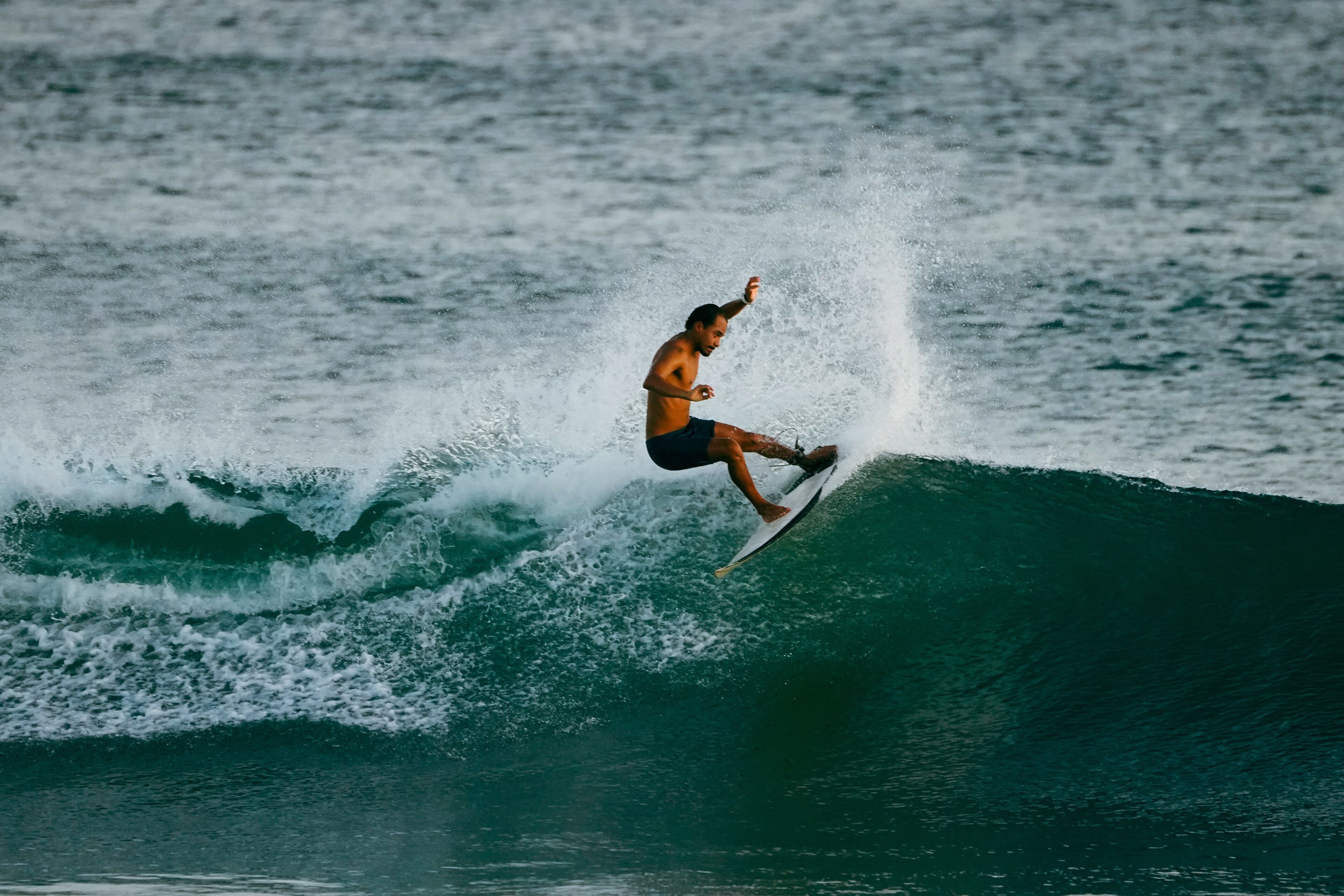 A surfer riding a wave.
