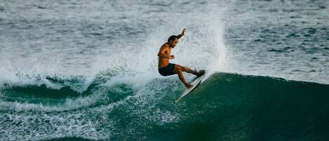A surfer riding a wave.