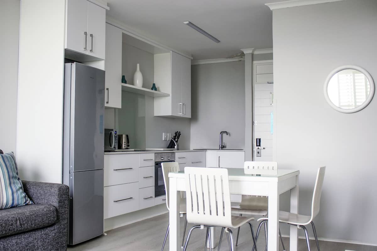 TWO BEDROOM FOUR SLEEPER - 328 | Living area | 40-inch TV with satellite channels, DVD player, iPod dock