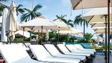 3 outdoor pools, pool umbrellas, pool loungers