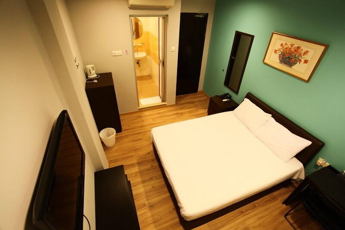 Habitación superior | Tabla de planchar con plancha