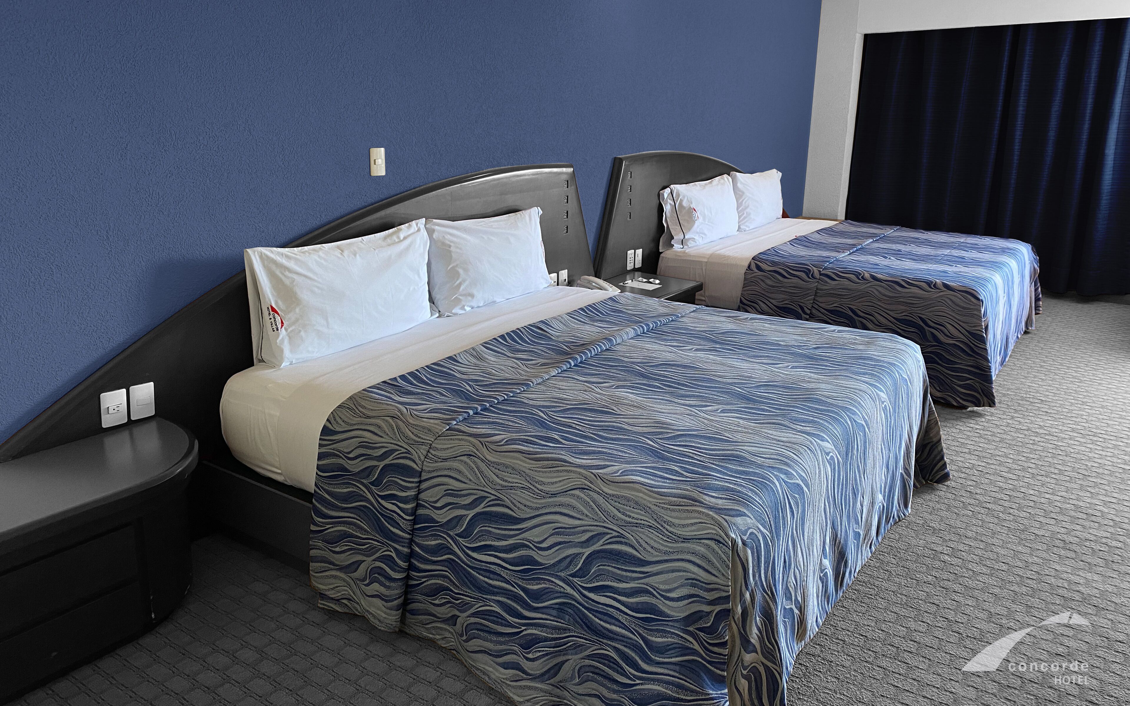 family room | 1 bedroom, in-room safe, desk, blackout curtains