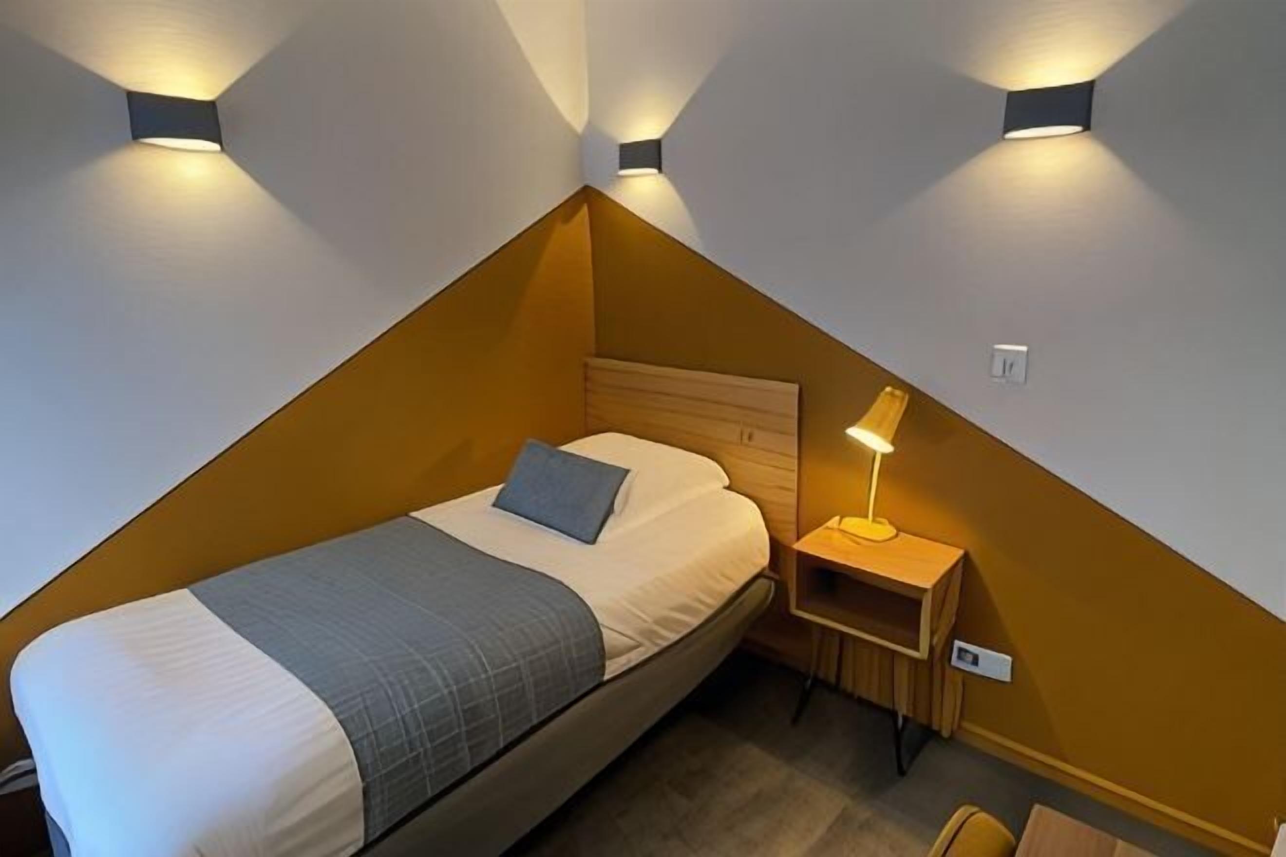 Roupas de cama premium, cofres nos quartos, individualmente mobiliados
