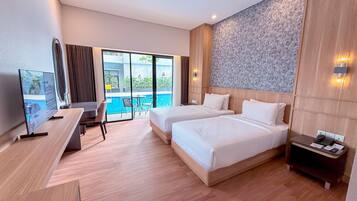 Deluxe Double or Twin Room | Free minibar, in-room safe, desk, laptop workspace