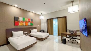 Deluxe Double or Twin Room | Free minibar, in-room safe, desk, laptop workspace
