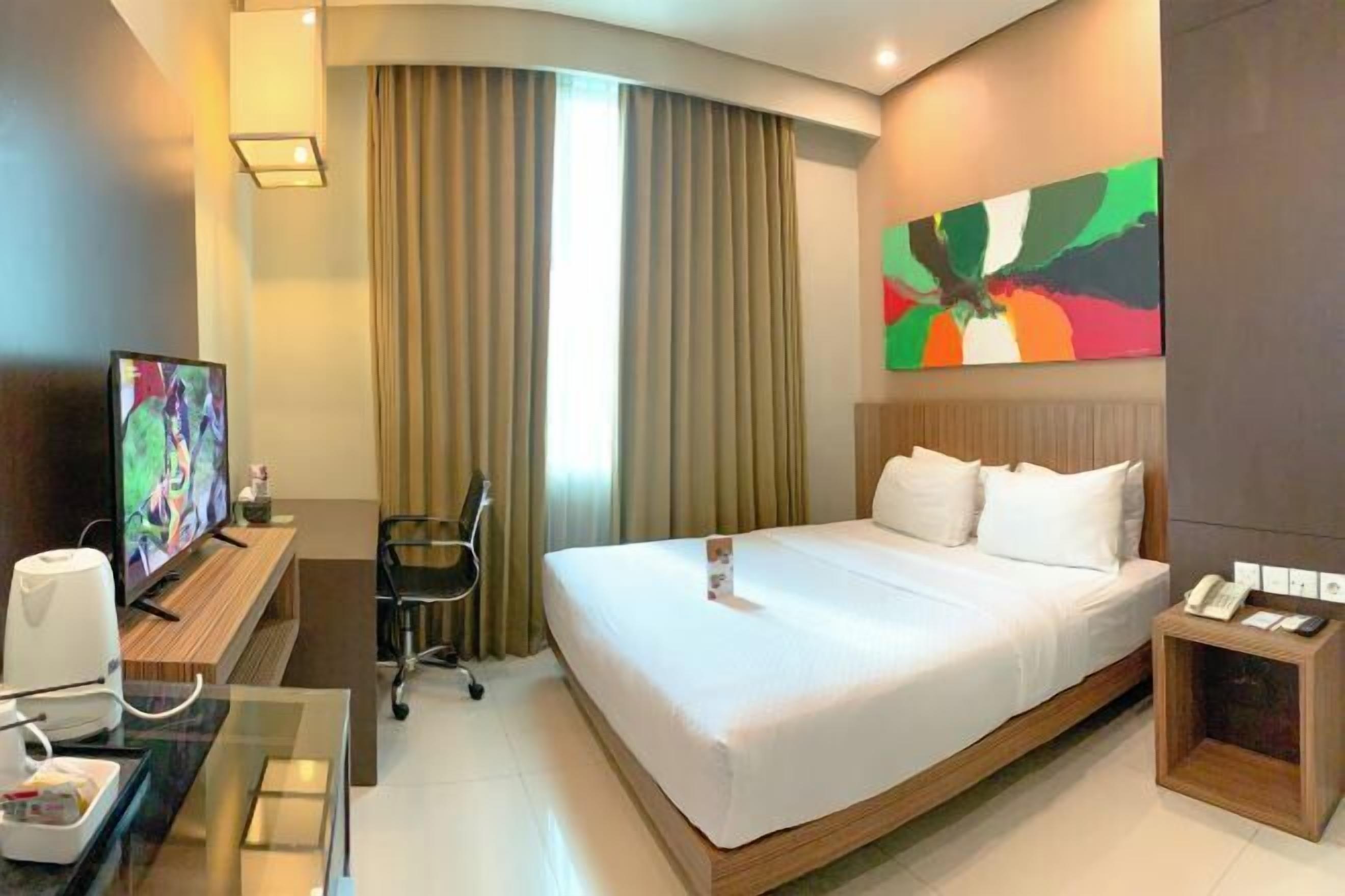 Free minibar, in-room safe, desk, laptop workspace