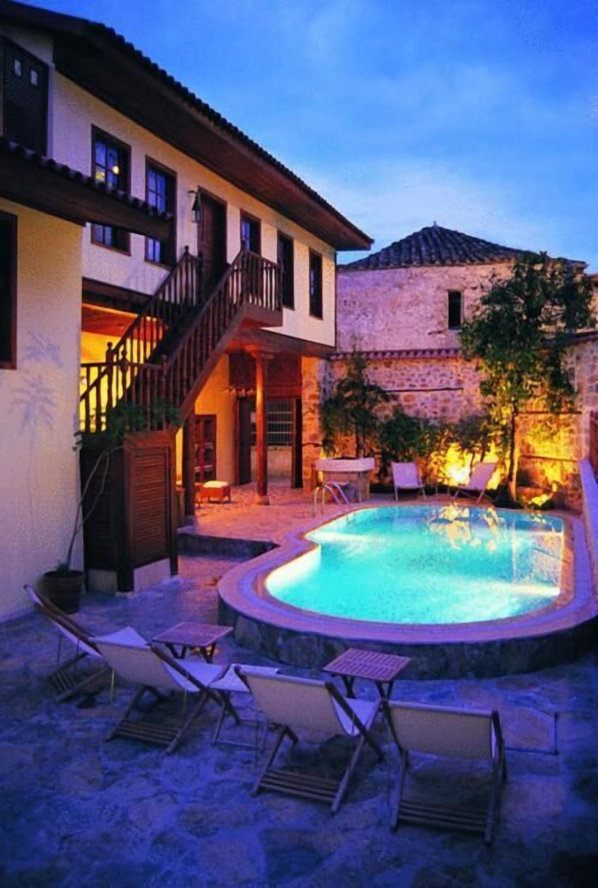 seasonal outdoor pool, pool umbrellas, pool loungers