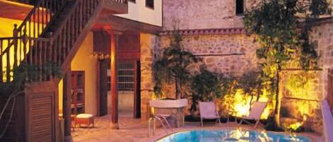 Seasonal outdoor pool, pool umbrellas, pool loungers