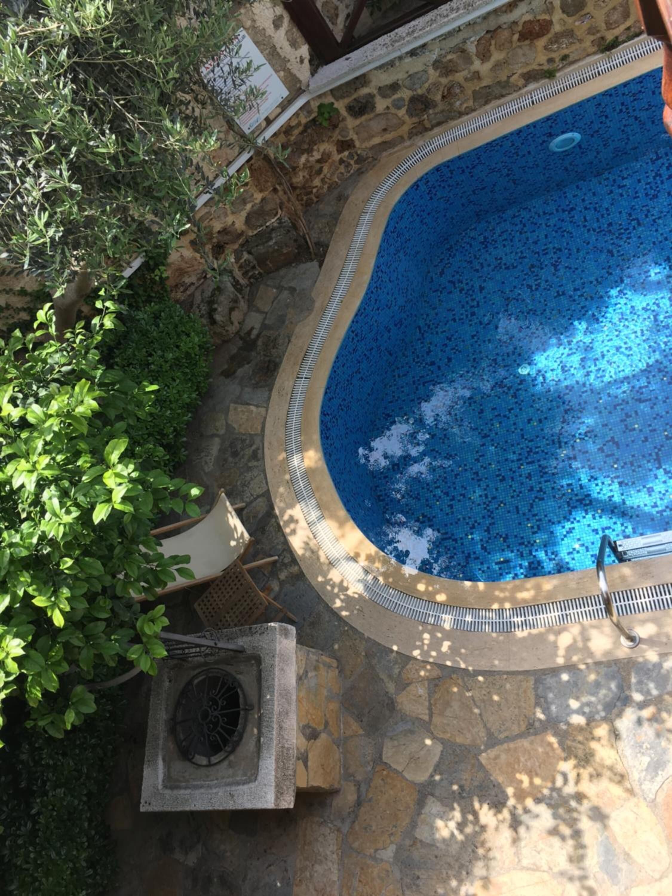 seasonal outdoor pool, pool umbrellas, pool loungers