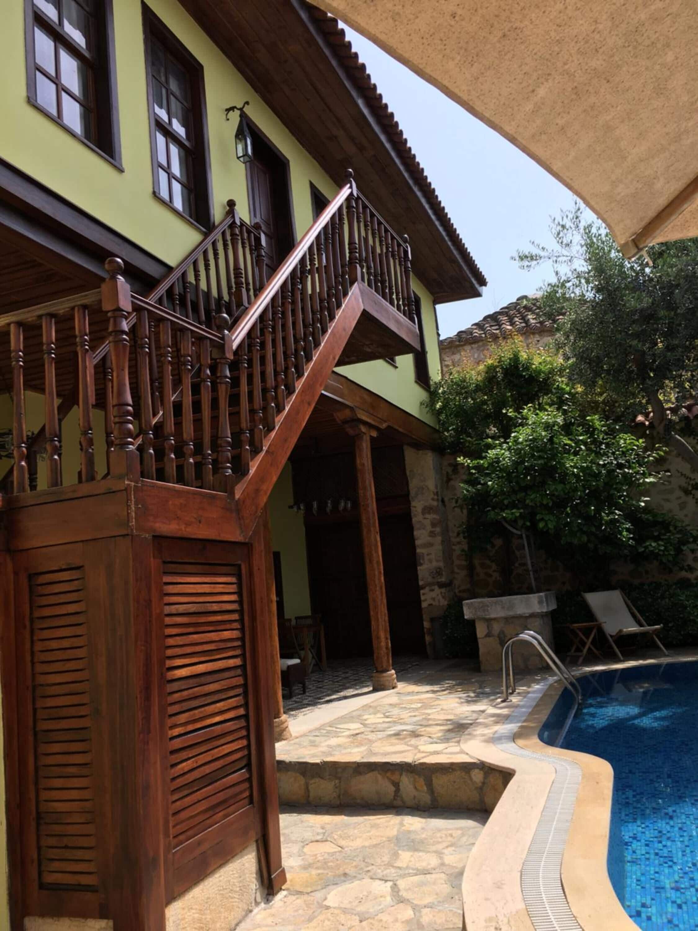 seasonal outdoor pool, pool umbrellas, pool loungers