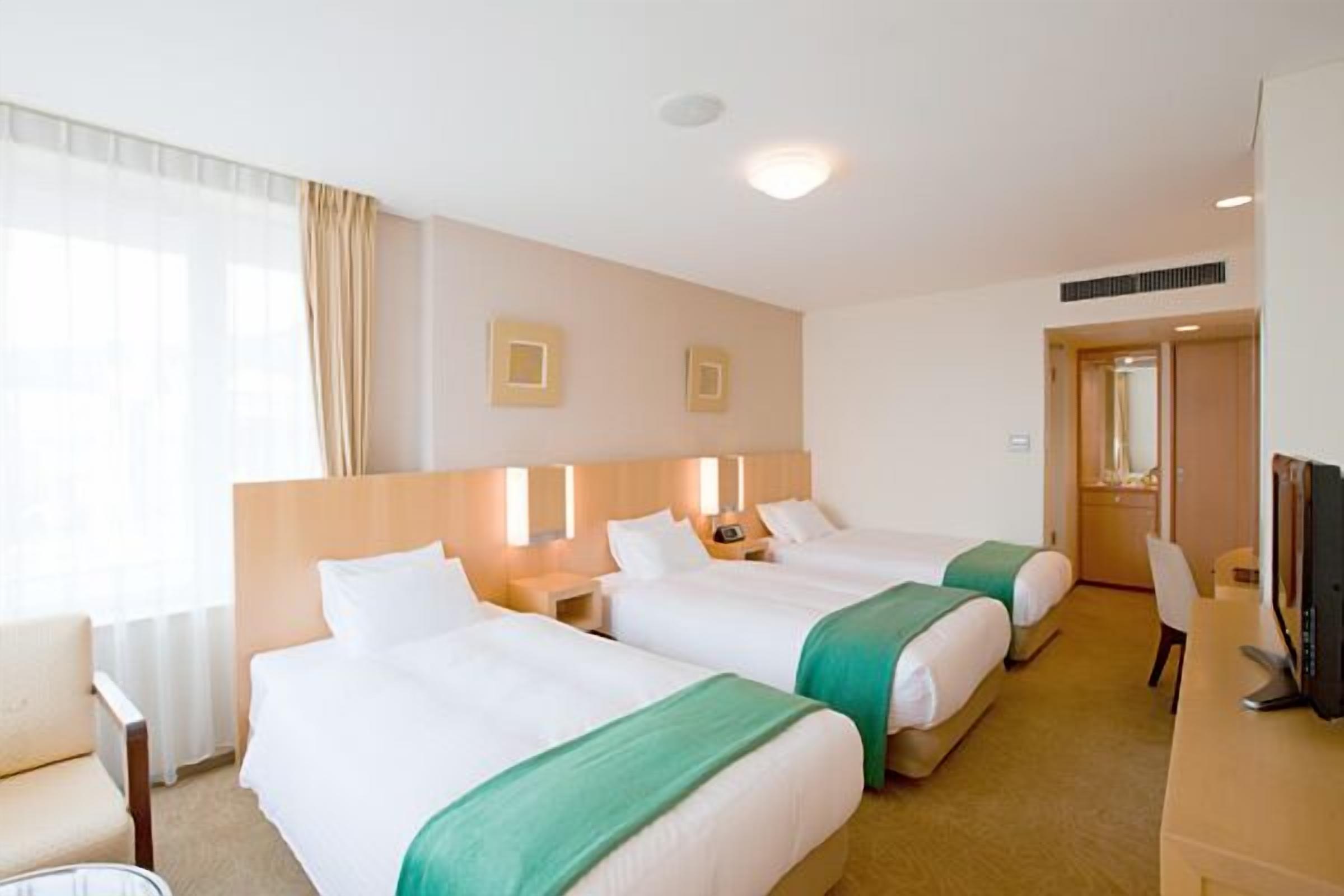 desk, laptop workspace, iron/ironing board, cots/infant beds