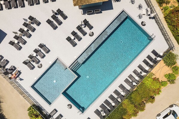 Outdoor pool, open 9:00 AM to 9:00 PM, pool umbrellas, pool loungers