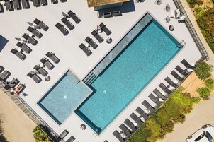Outdoor pool, open 9:00 AM to 9:00 PM, pool umbrellas, sun loungers