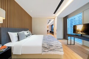 Suite Exécutive, 1 chambre | Coffres-forts dans les chambres, bureau, chambres insonorisées