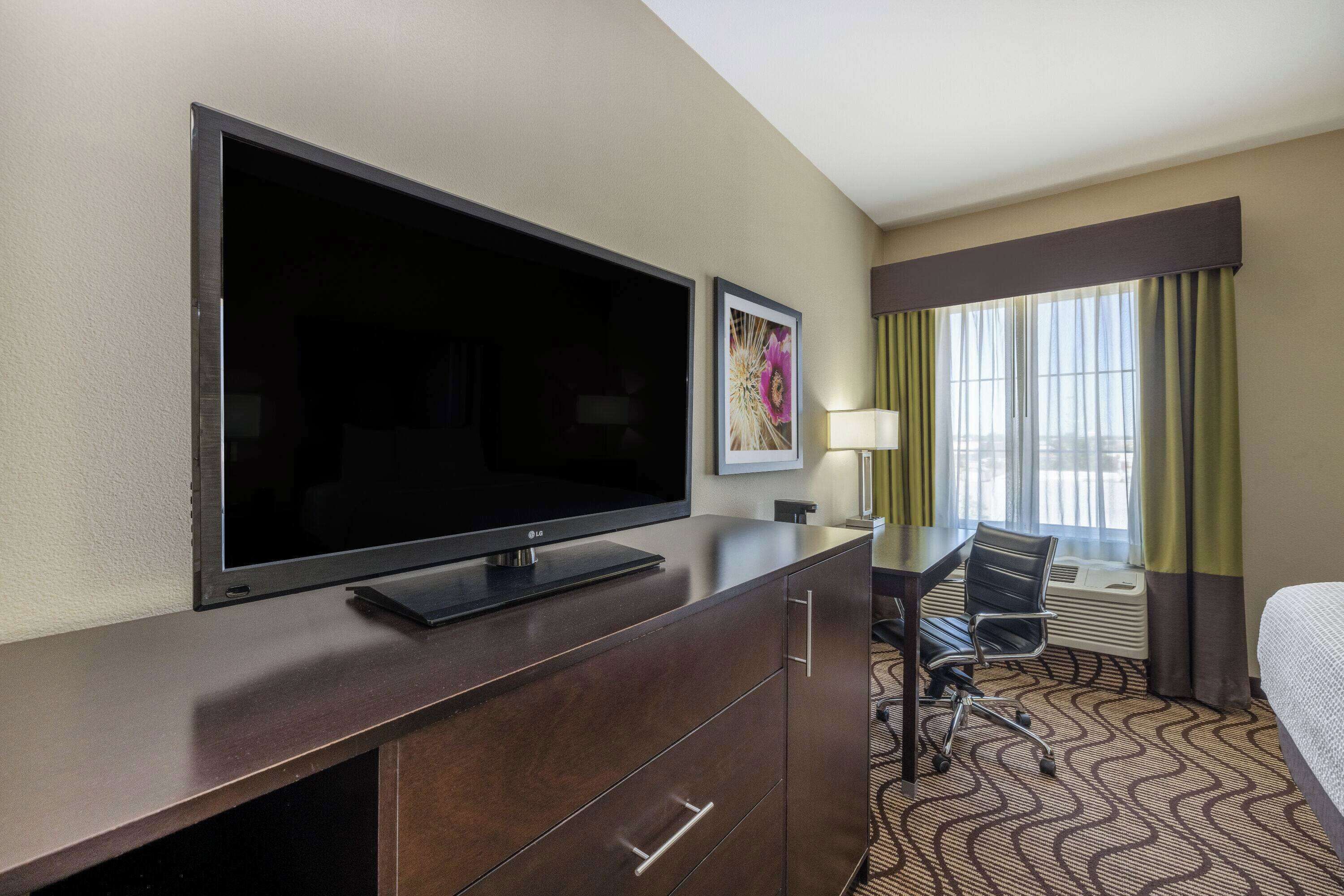 premium bedding, pillow-top beds, desk, blackout curtains