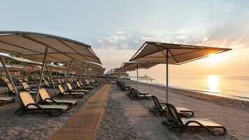 Private beach, sun loungers, beach umbrellas, water skiing