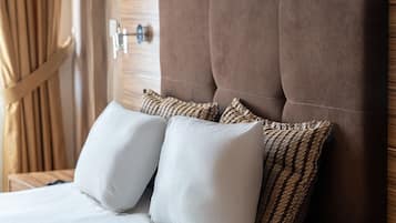 Standard Quadruple Room | 1 bedroom, free minibar items, in-room safe, individually decorated