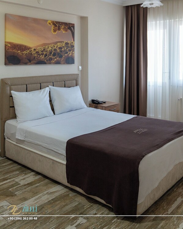 1 غرفة نوم وأغطية فراش متميزة ومأكولات ومشروبات مجانية في الميني بار