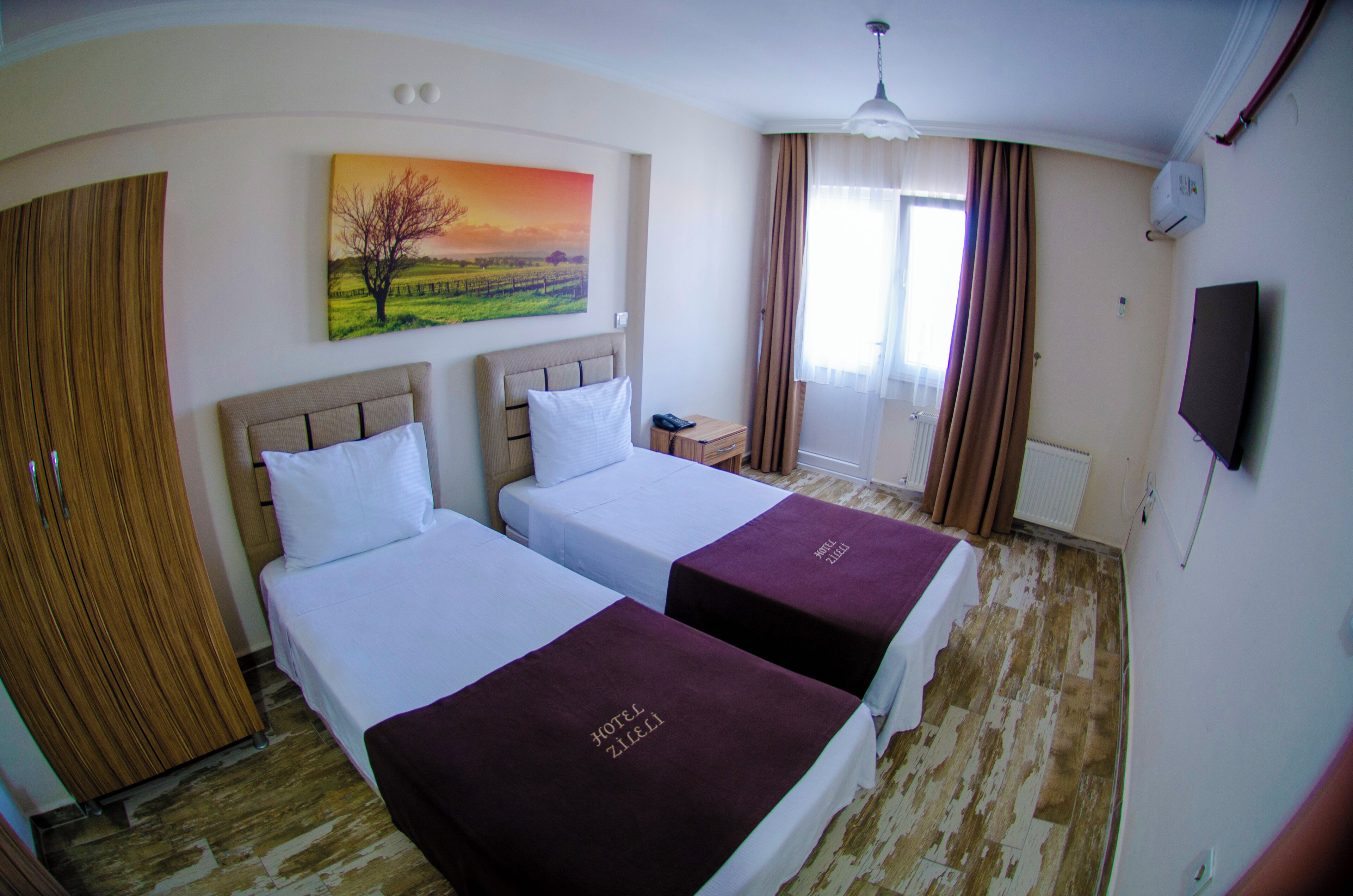 Standard Triple Room | 1 bedroom, free minibar items, in-room safe, individually decorated