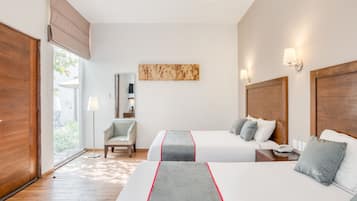 Habitación doble familiar | Vista al jardín
