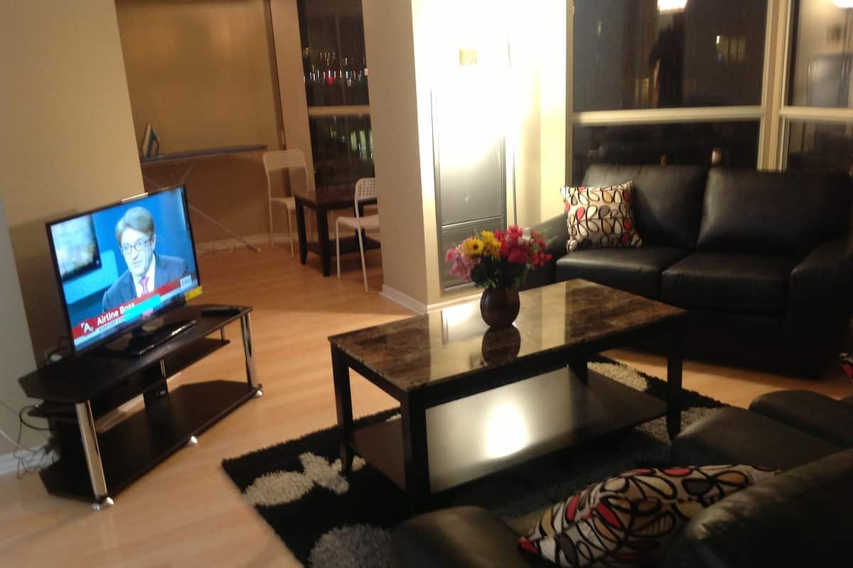 Standaard kamer | Woonkamer | Flatscreentelevisie