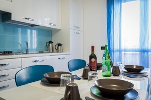 Family Double Room | Private kitchen | Espresso maker, coffee/tea maker