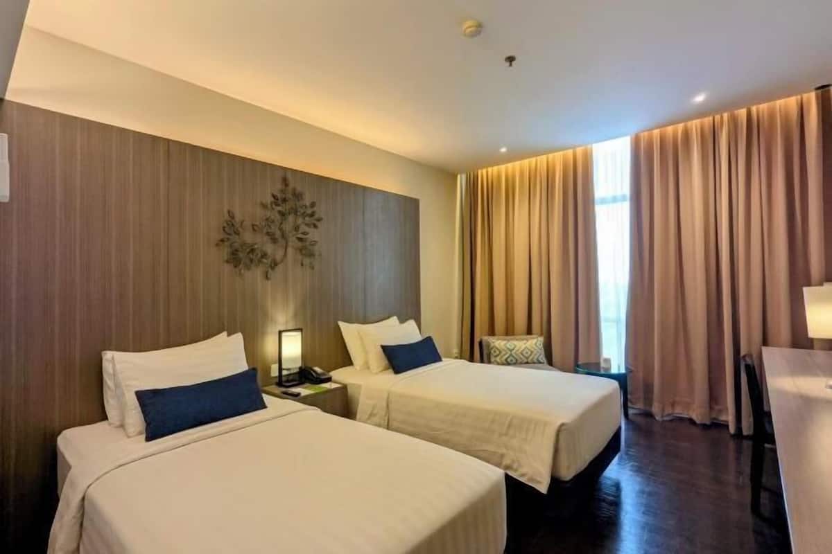 Ropa de cama de alta calidad, minibar, caja fuerte y escritorio
