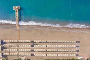 Private beach, sun loungers, beach umbrellas, beach towels