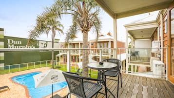 Pool View One Bedroom Apartment | Balcony view