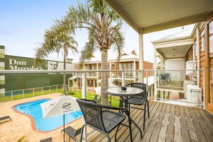 Pool View One Bedroom Apartment | Balcony view