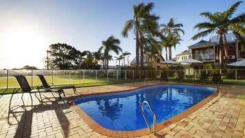 Outdoor pool, pool umbrellas, sun loungers