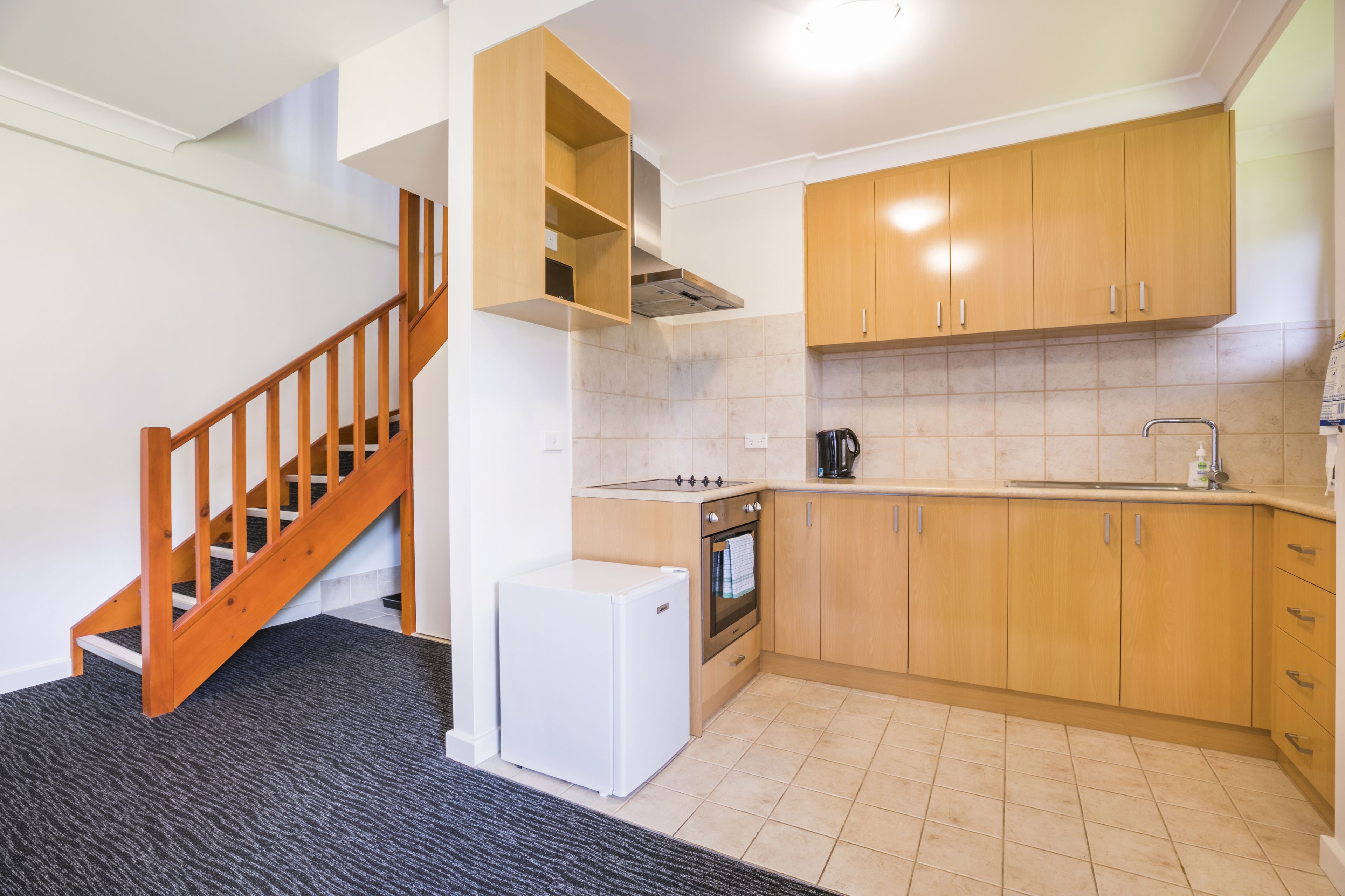 fridge, microwave, stovetop, electric kettle