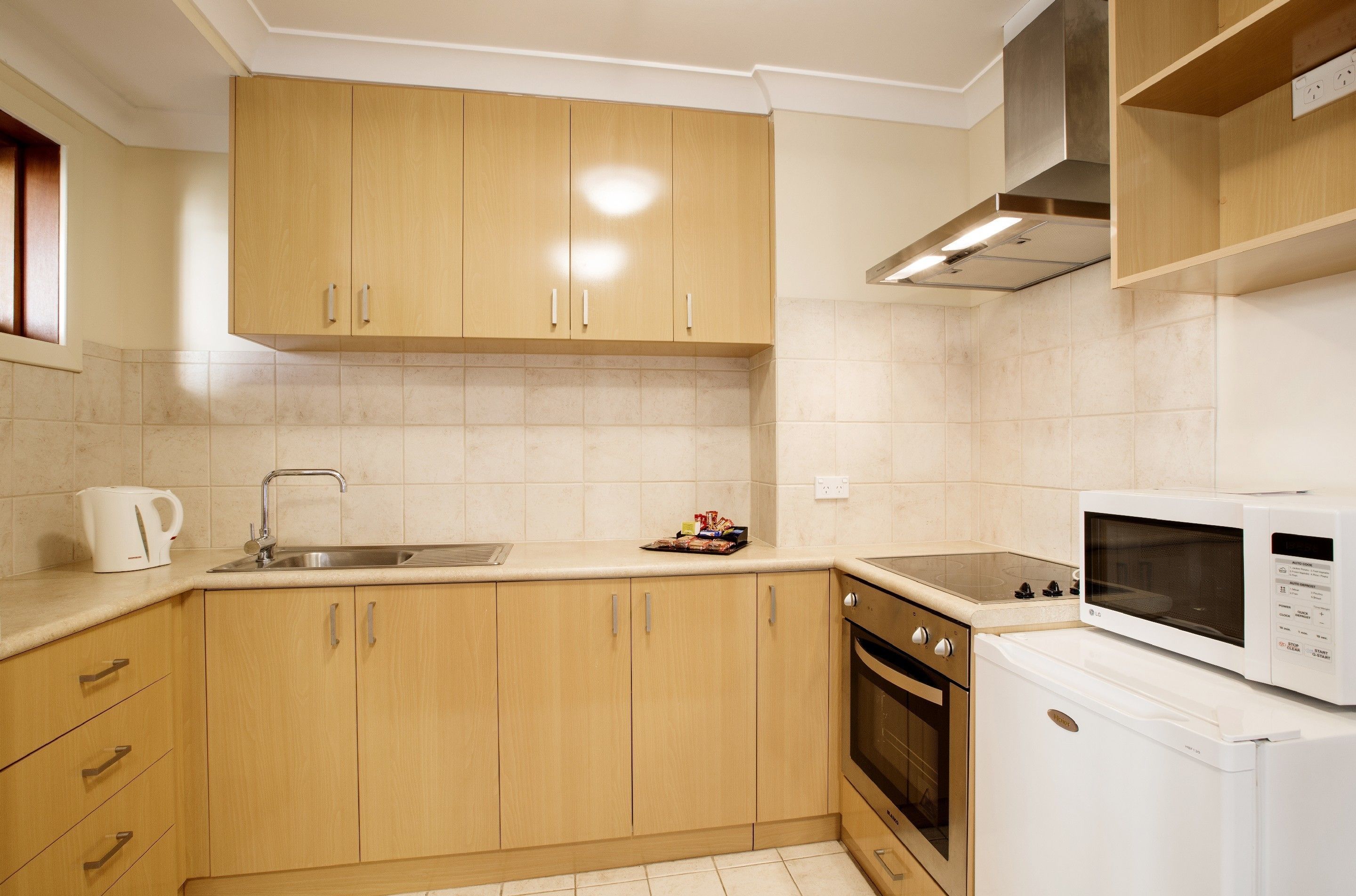 fridge, microwave, stovetop, electric kettle