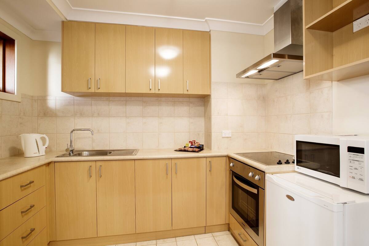 fridge, microwave, stovetop, electric kettle