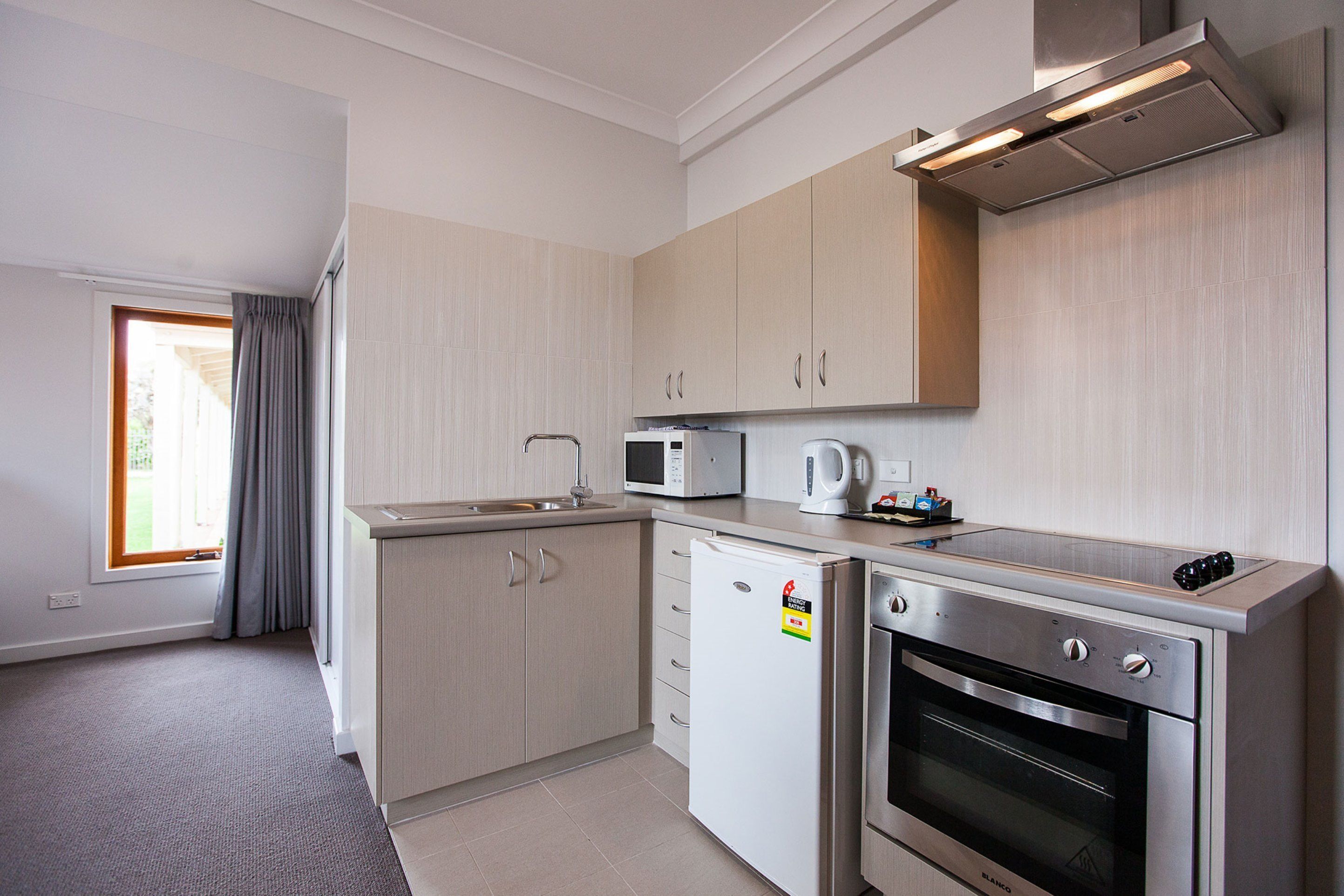 fridge, microwave, stovetop, electric kettle