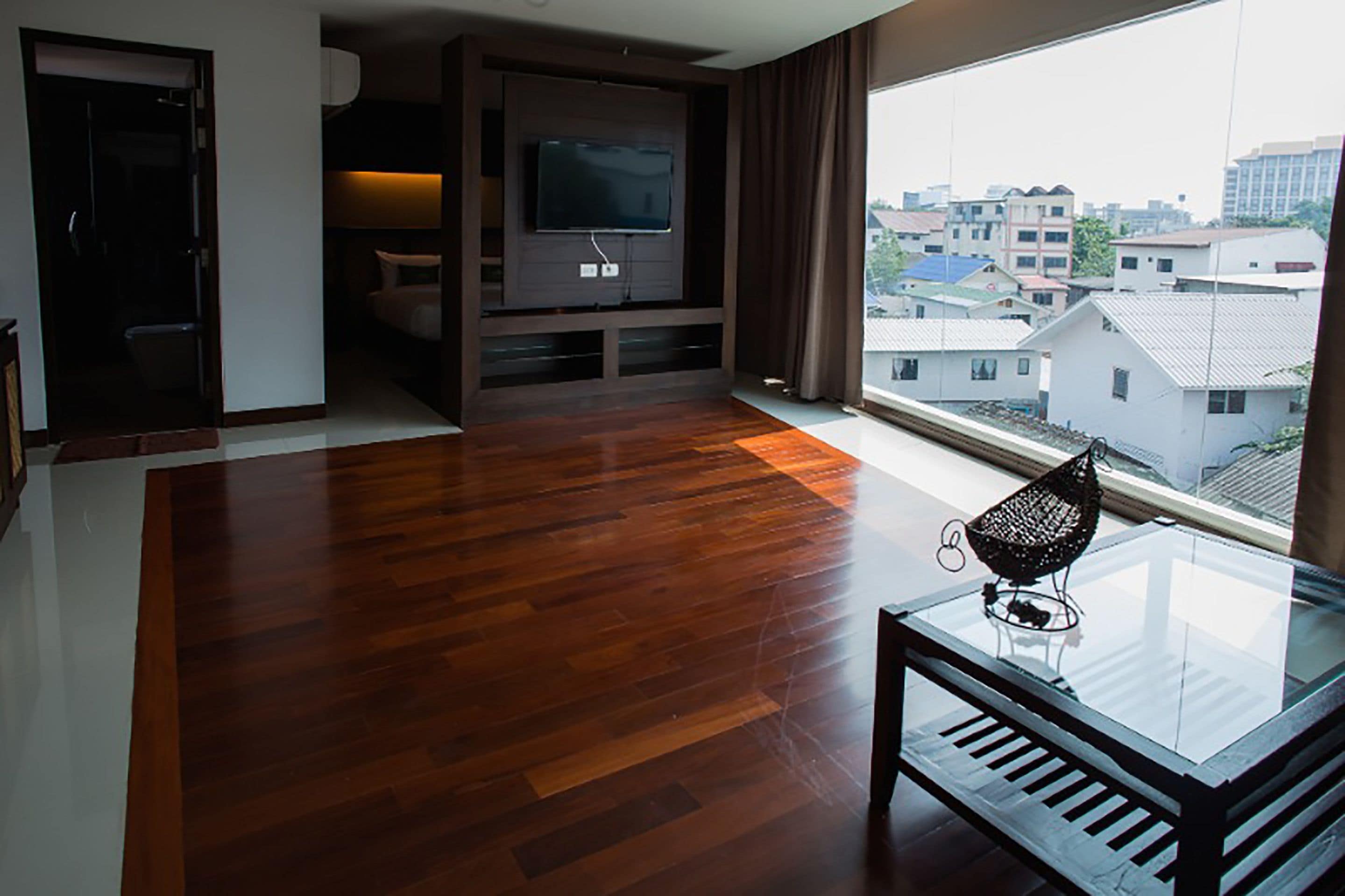 junior quadruple room, multiple beds, accessible, garden view | living area | 32-inch flat-screen tv with cable channels, tv