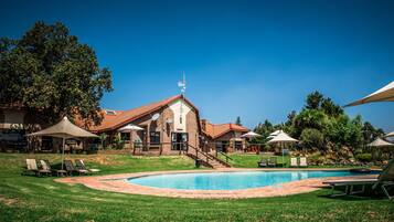 2 outdoor pools, pool umbrellas, pool loungers