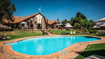 2 outdoor pools, pool umbrellas, pool loungers