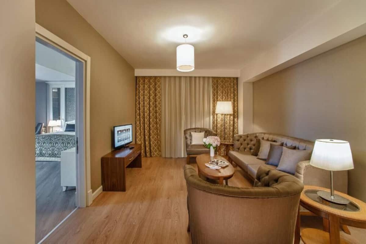 Habitación familiar | Ropa de cama de alta calidad y minibar