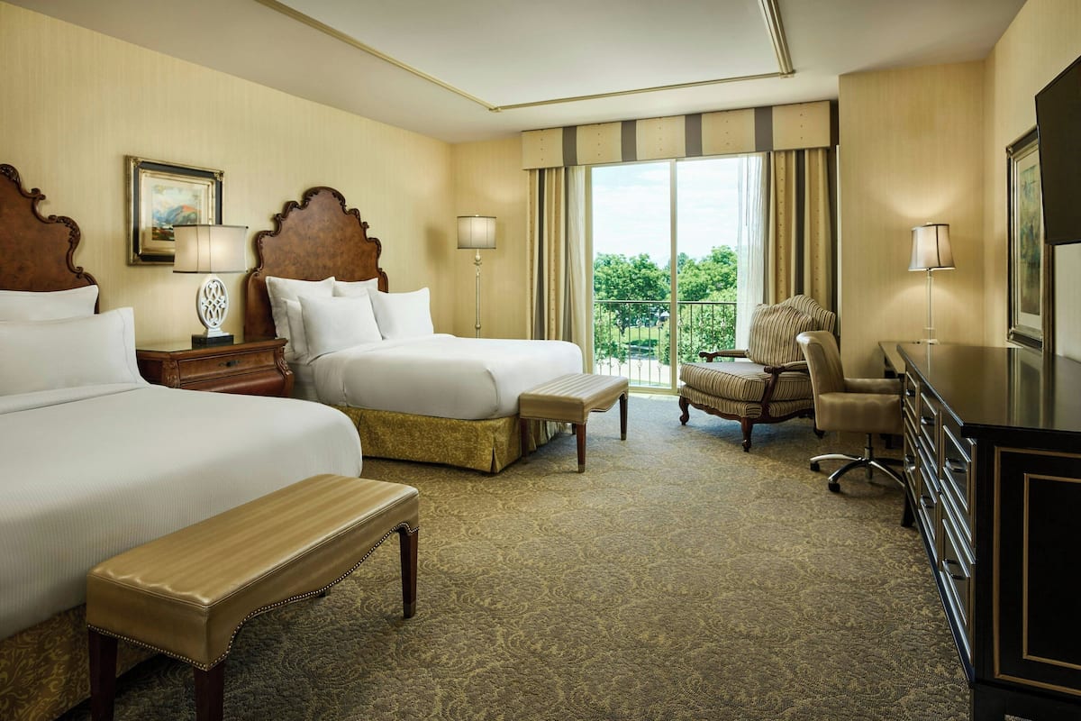 Premium bedding, down comforters, pillowtop beds, in-room safe