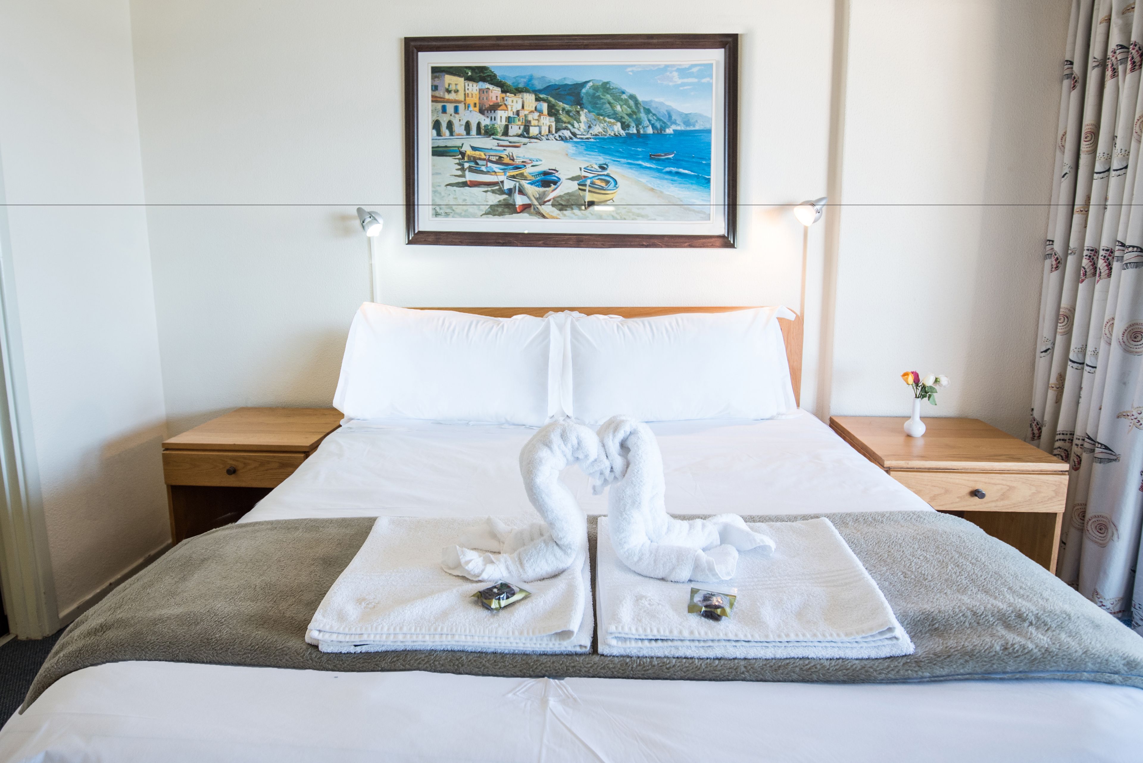 Apartment, 3 Bedrooms, Sea View | 3 bedrooms, in-room safe, desk, iron/ironing board