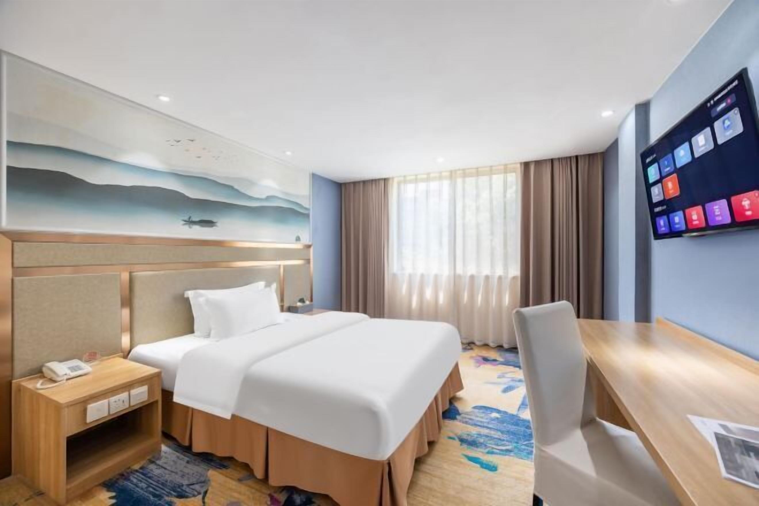 Minibar, meja kerja, tempat tidur lipat/tambahan, dan Wi-Fi gratis