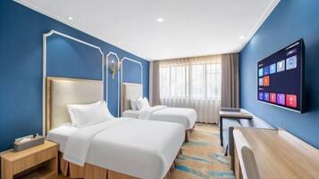 Minibar, escritorio, camas extra y wifi gratis