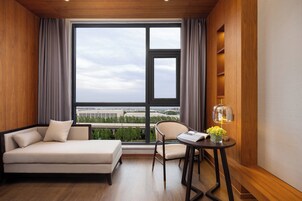 Premium bedding, down duvets, minibar, in-room safe