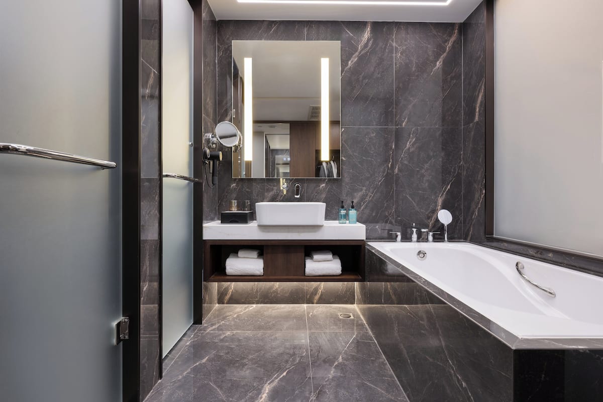 premium bedding, down duvets, minibar, in-room safe