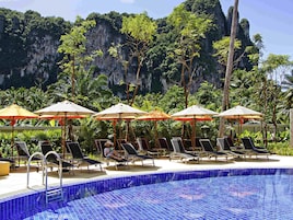 Outdoor pool, open 8:00 AM to 7:00 PM, pool umbrellas, pool loungers